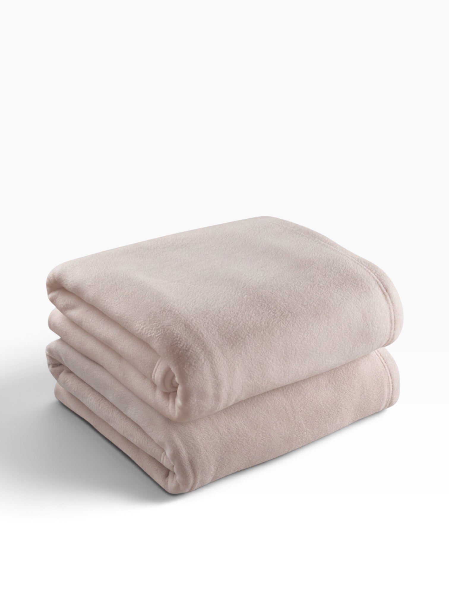 Valiant Products tan microfiber fleece blanket folded neatly, featuring a soft low-pile texture and durable stitching.