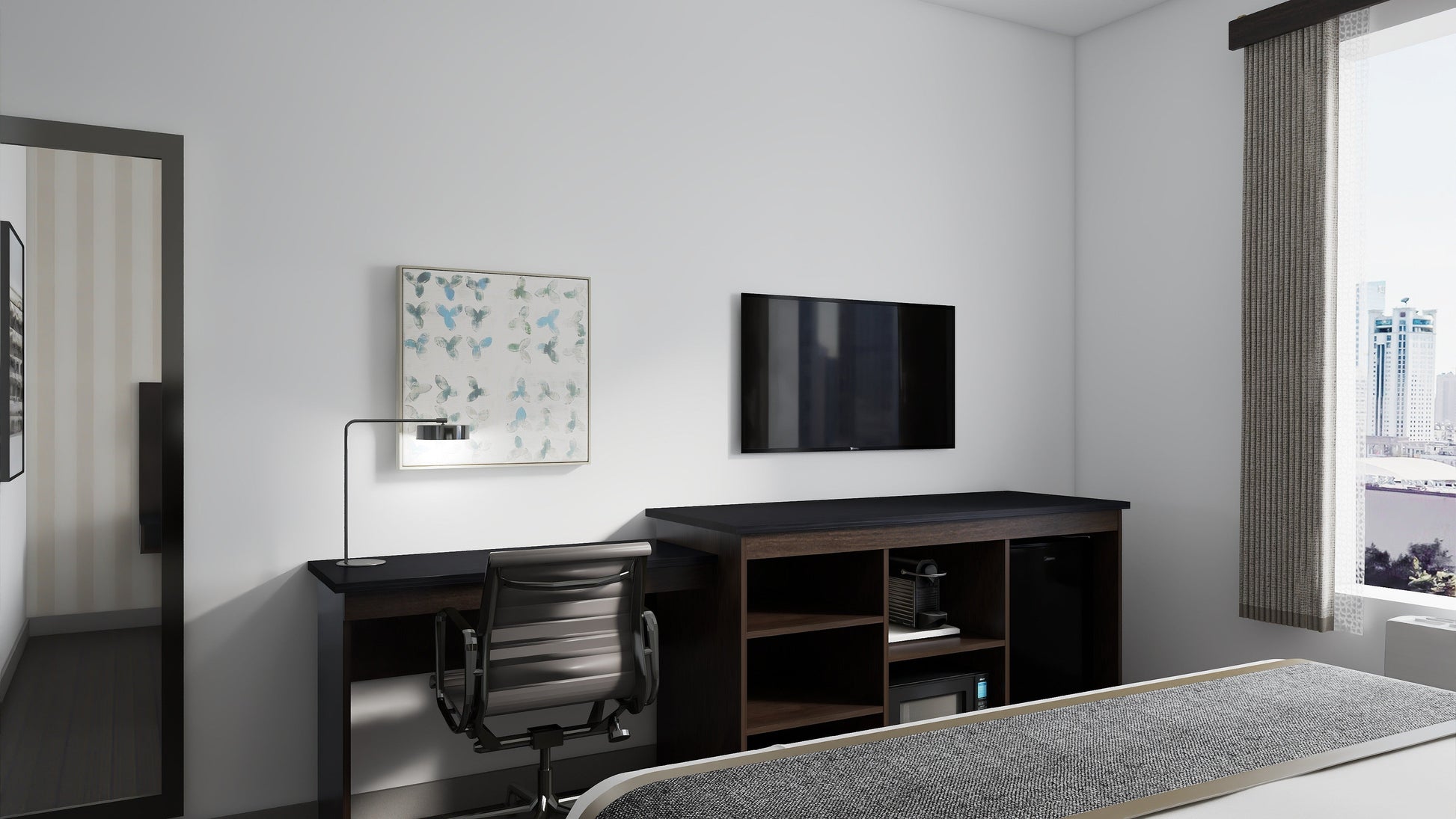 Valiant Products Telluride Unit featuring a dark wood desk and integrated storage console for appliances in a hotel room