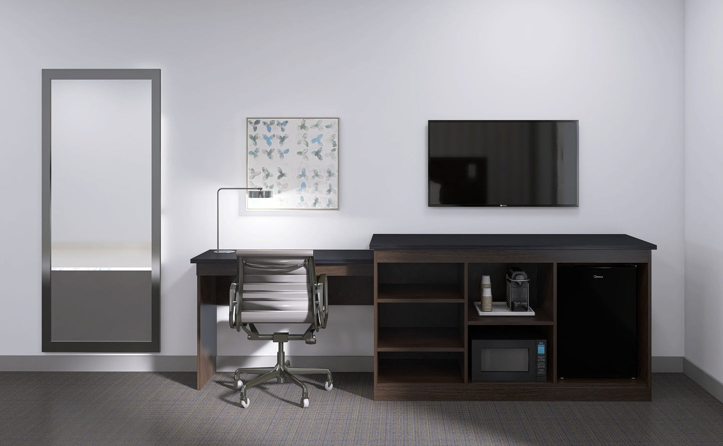 Valiant Products Telluride Unit featuring a dark wood desk and appliance console with a black top in a hotel room.