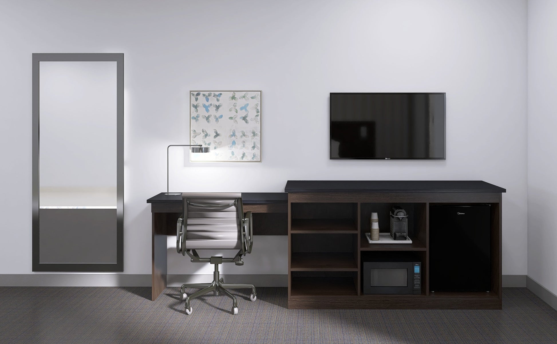 Valiant Products Telluride Unit featuring a dark wood desk and appliance console with a black top in a hotel room.