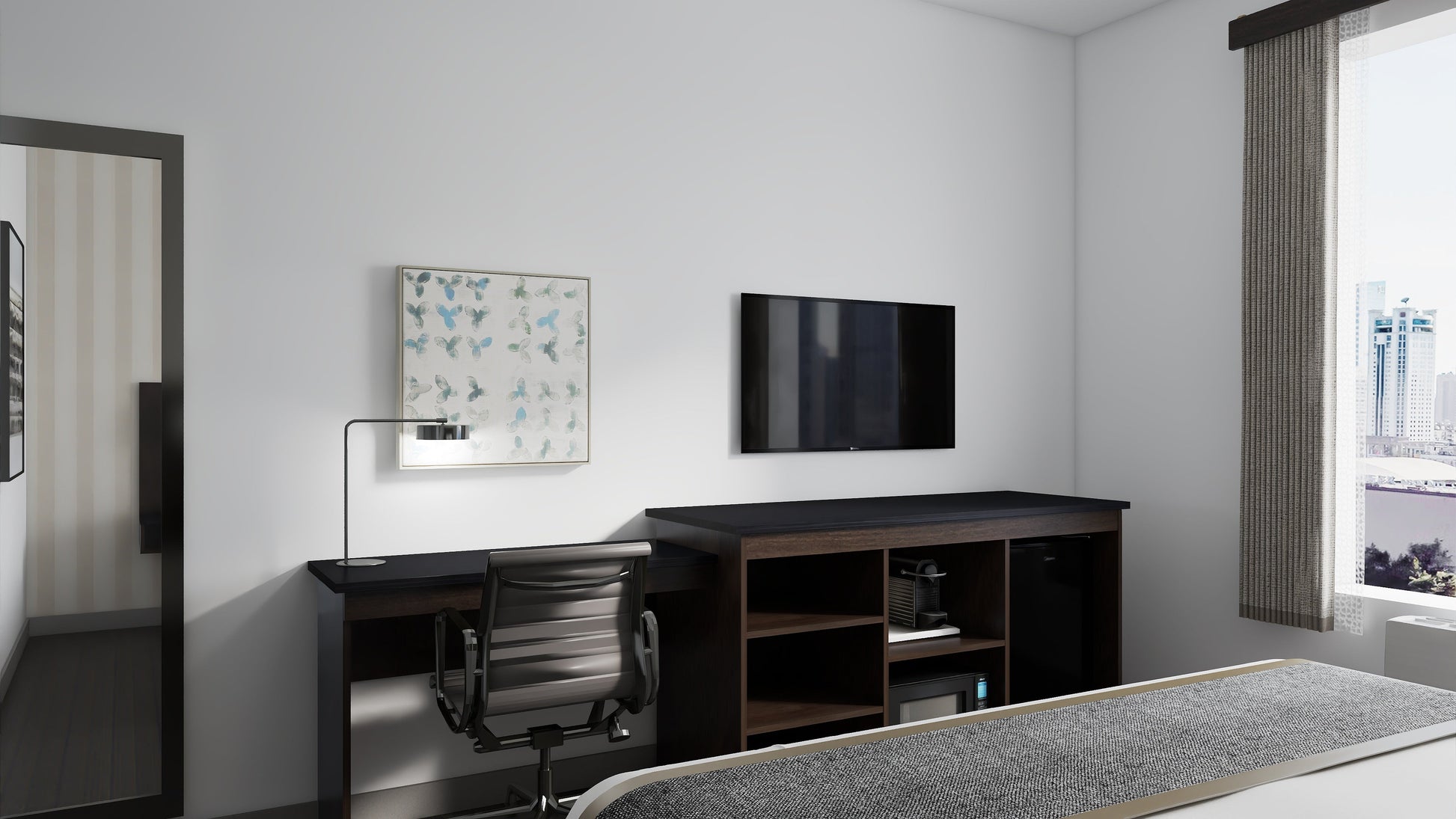 Valiant Products Telluride Unit featuring a dark wood desk and storage console with open shelving in a hotel room.