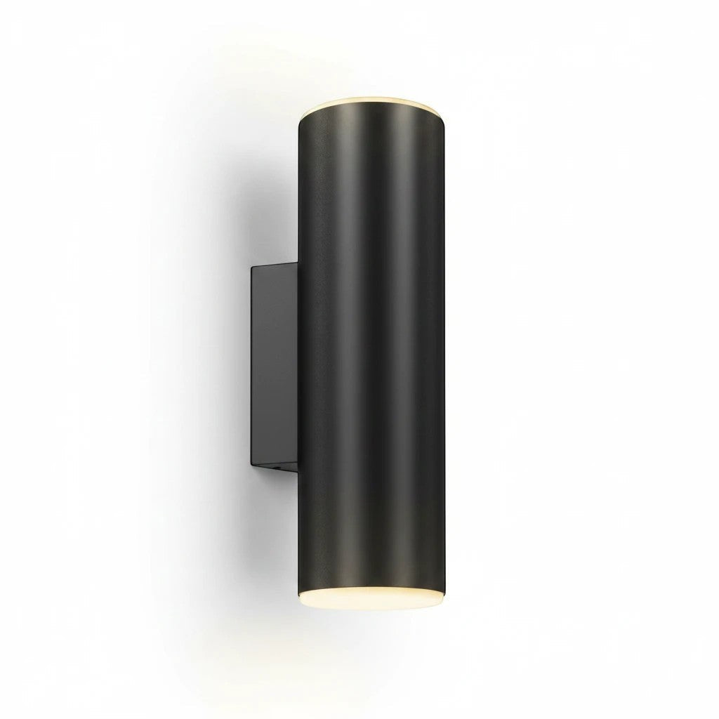 Valiant Products Totem wall sconce in matte black with a cylindrical LED light design for modern indoor lighting.