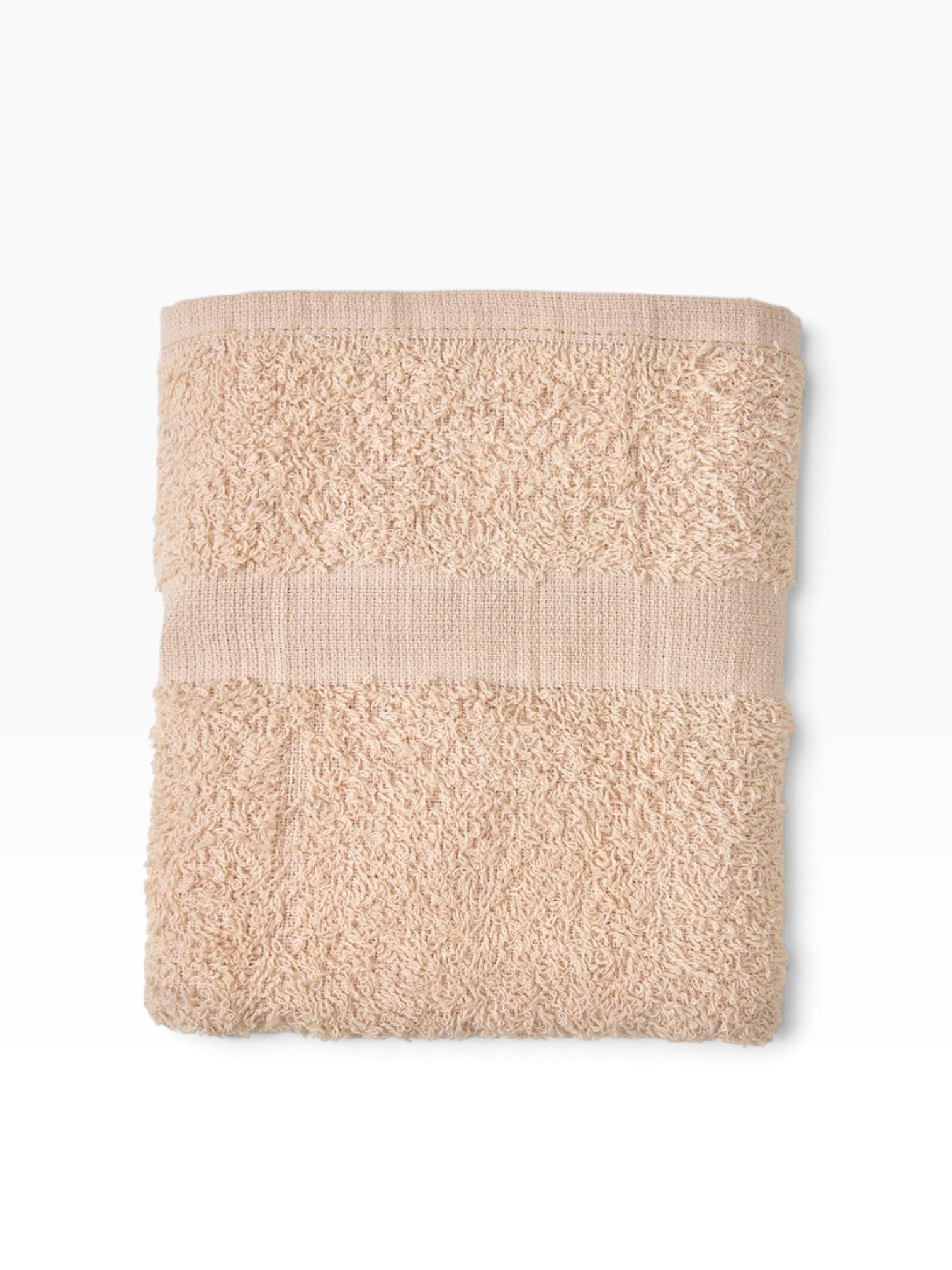 Valiant Products Unity CAM border bath mat in beige cotton with a plush, absorbent texture and durable hemmed edges.