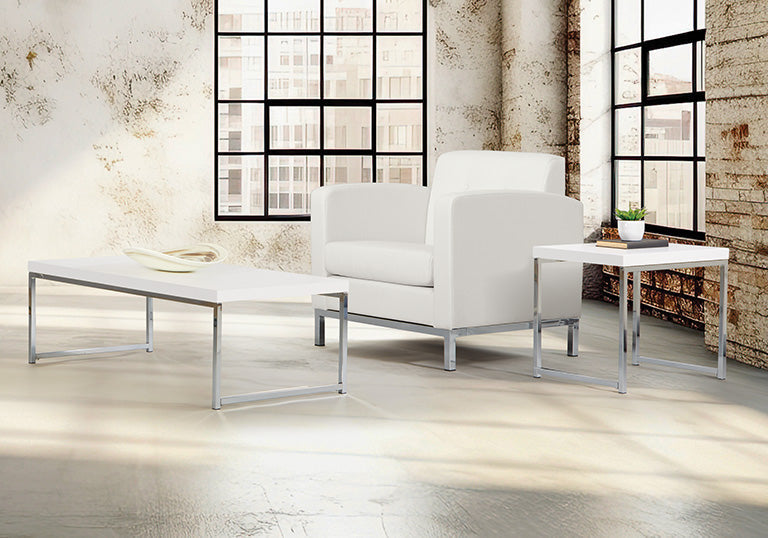 Valiant Products Walden coffee table with white laminate top and chrome frame in a modern industrial living room