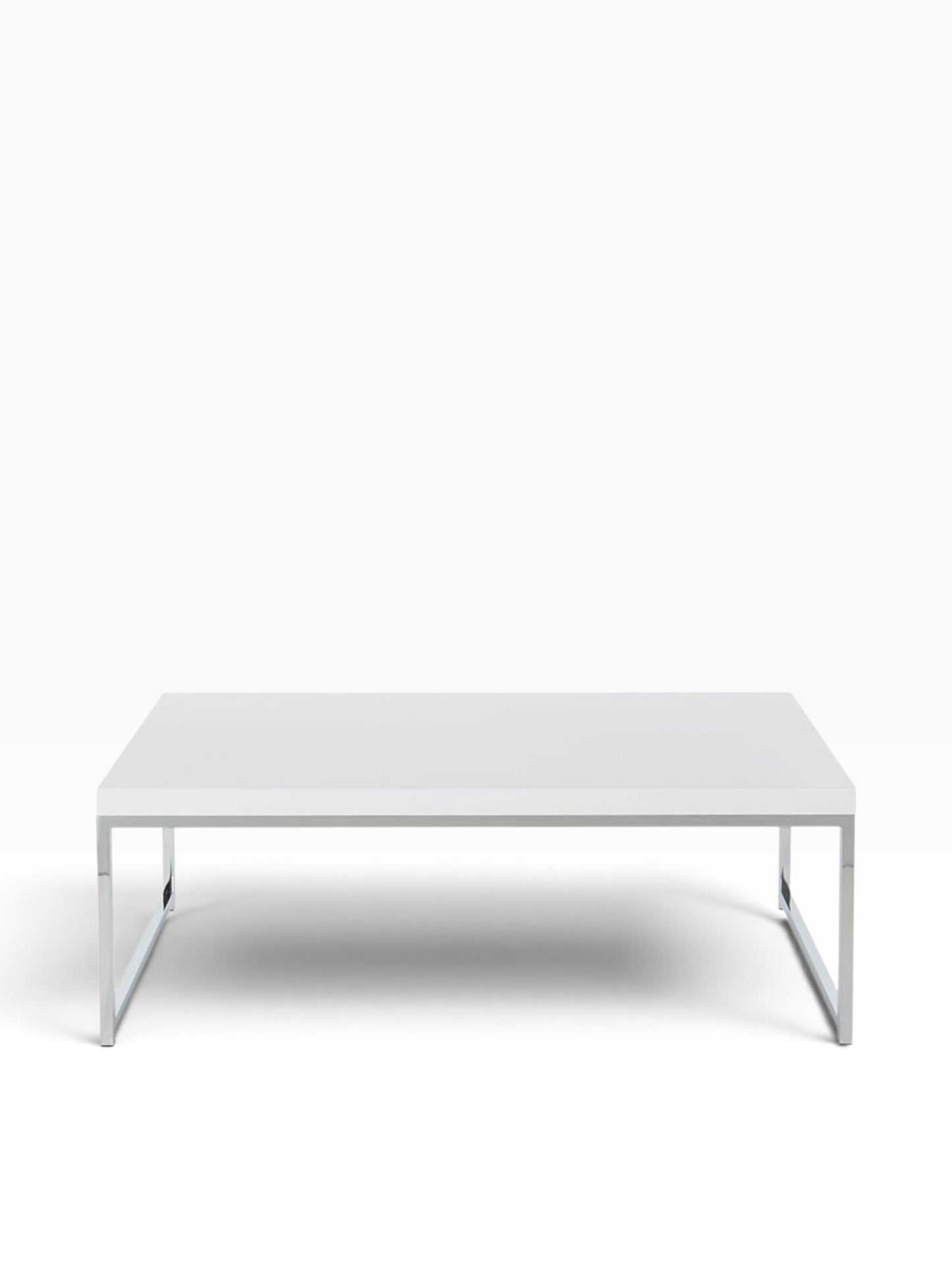 Valiant Products Walden coffee table with a white scratch-resistant laminate top and a modern chrome metal frame.