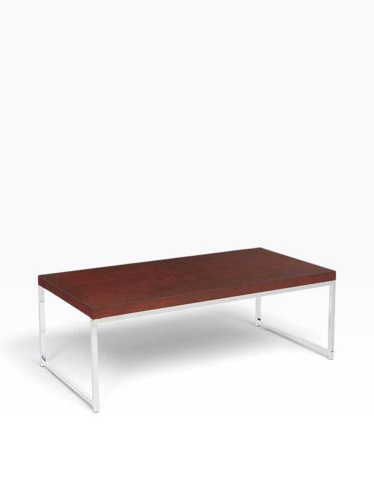 Valiant Products Walden coffee table featuring a dark woodgrain laminate top and a modern chrome metal frame.