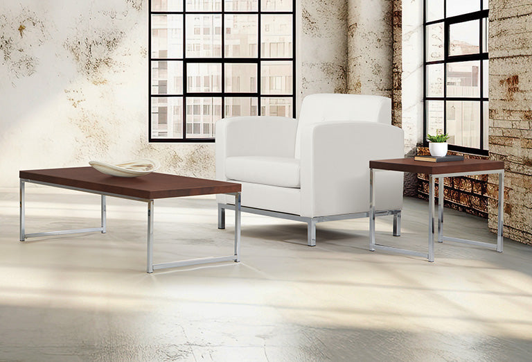 Valiant Products Walden end table with woodgrain laminate top and chrome frame in a modern living room setting.