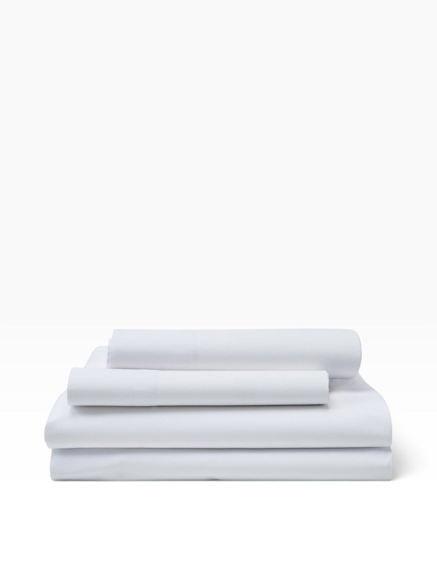 Valiant Products Royal Suite white T-300 cotton blend flat sheets folded in a neat stack for hospitality use