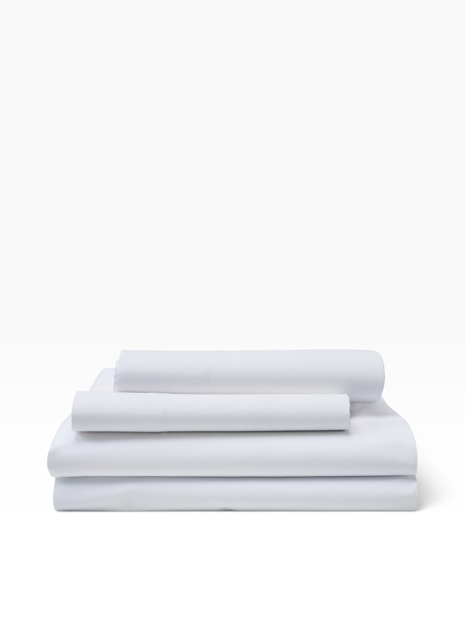 Valiant Products Royal Suite white T-300 cotton blend flat sheets folded in a neat stack for hospitality use