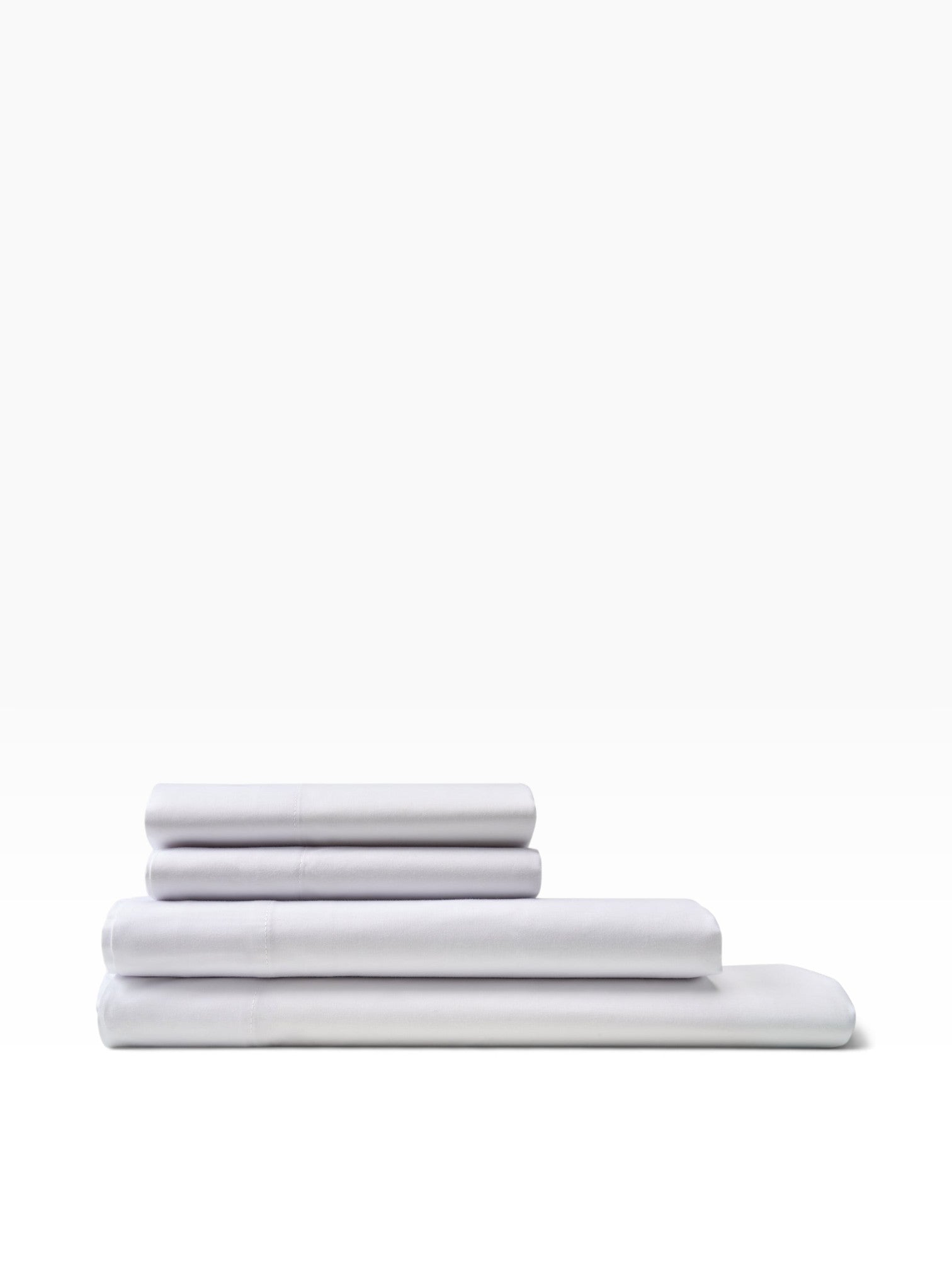 Valiant Products American Boutique 300 thread count white cotton flat sheets folded in a neat stack.