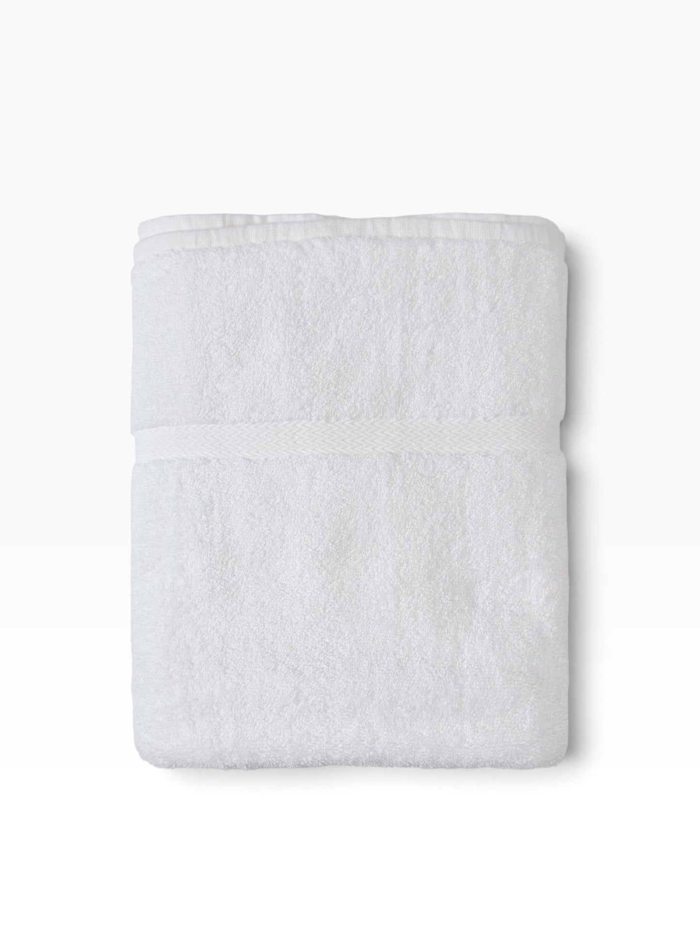 Valiant Products white Royal Suite bath towel with an elegant woven dobby border and plush cotton loop construction.