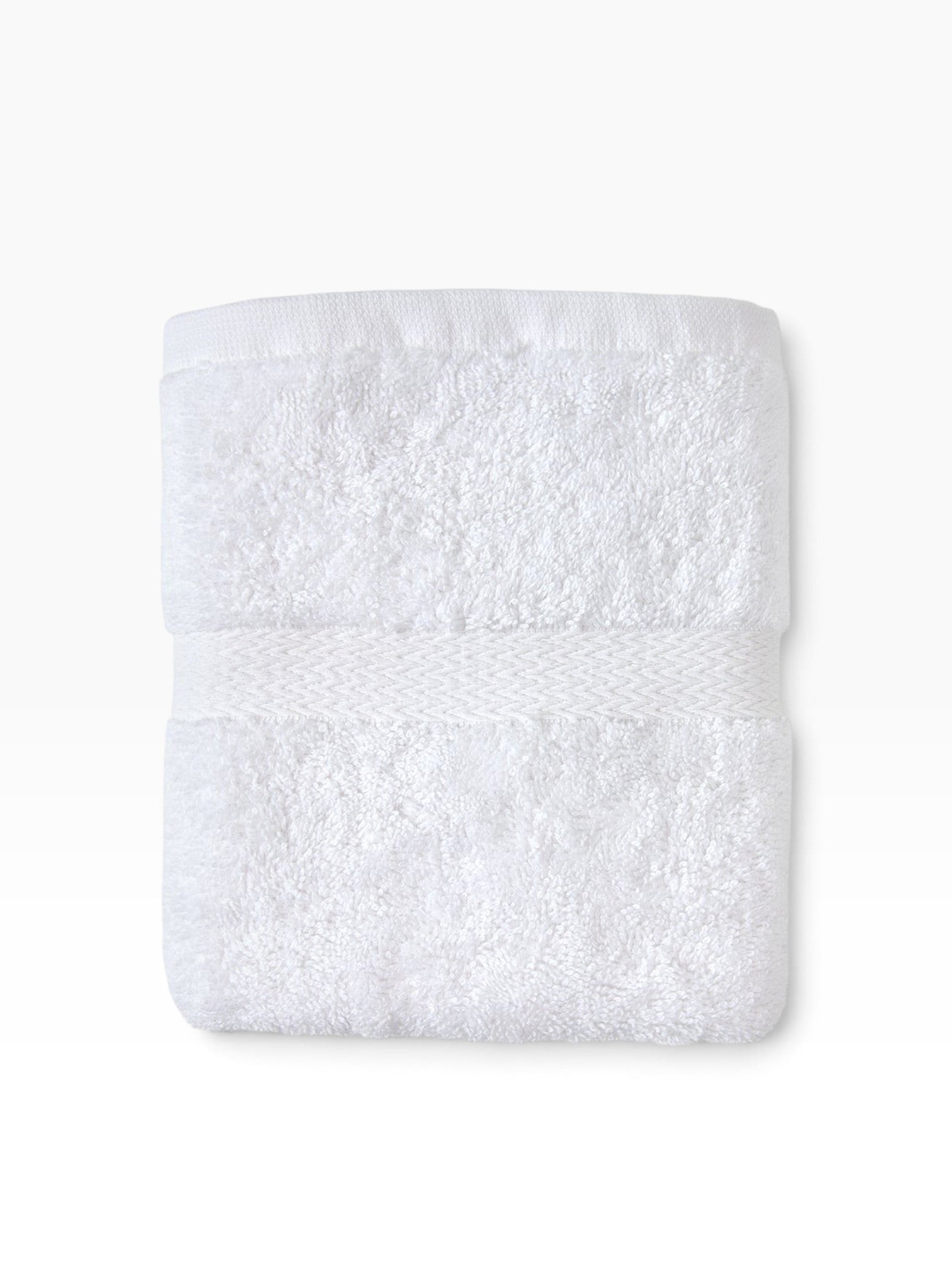 Valiant Products Royal Suite white cotton blend hand towel with a decorative dobby border texture.