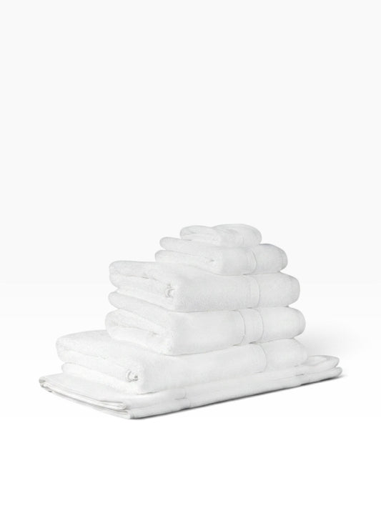 Valiant Products white Simplicity dobby border wash cloths stacked neatly on a white background.