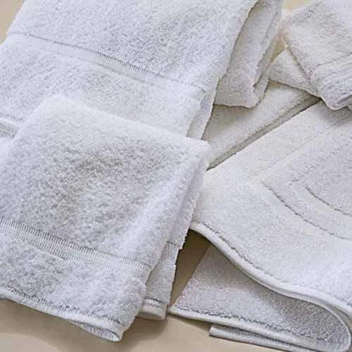 Valiant Products white Sovereign dobby border wash cloths with soft cotton loops and durable hemmed edges.