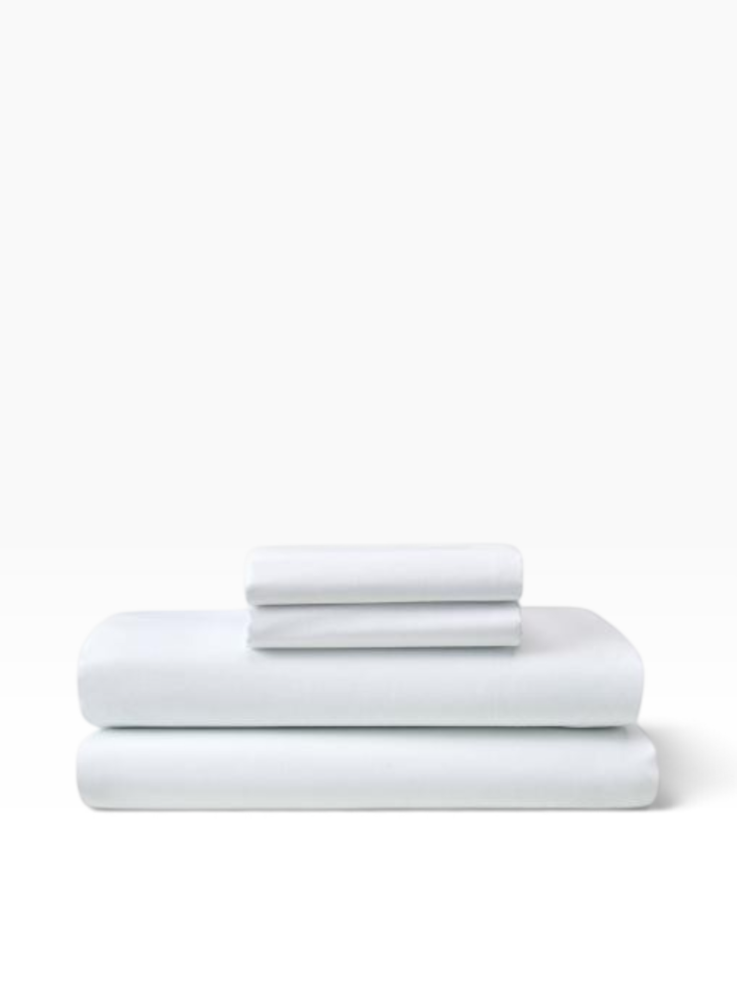 Valiant Products white T-200 thread count flat sheets in a crisp cotton-polyester blend for commercial use.