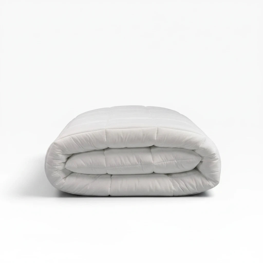 Valiant Products Ultra Touch white microfiber down alternative comforter with 8-inch quilted box stitch design.
