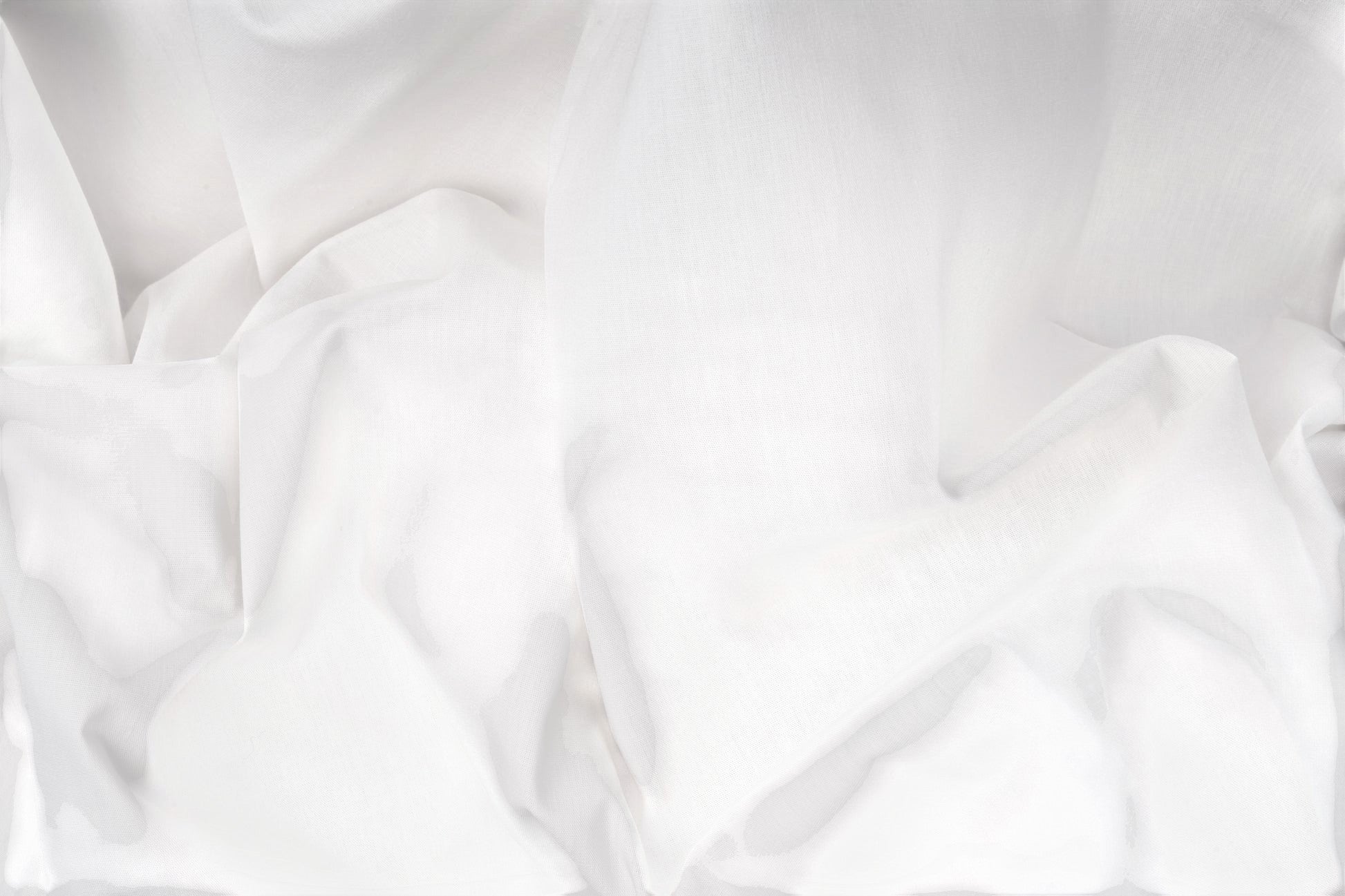 Valiant Products crisp white 200 thread count percale fitted sheet fabric with a smooth cotton polyester blend texture