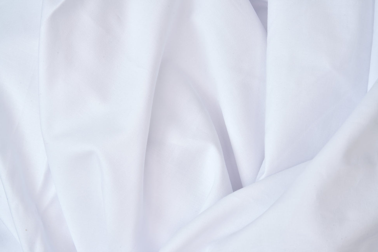 Valiant Products bright white 300 thread count cotton-polyester blend fabric with a smooth percale weave texture.
