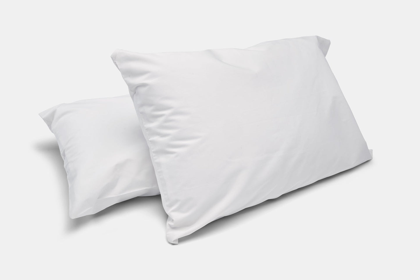 Valiant Products bright white T-200 thread count cotton-polyester blend pillowcases with a durable 3-inch hem.
