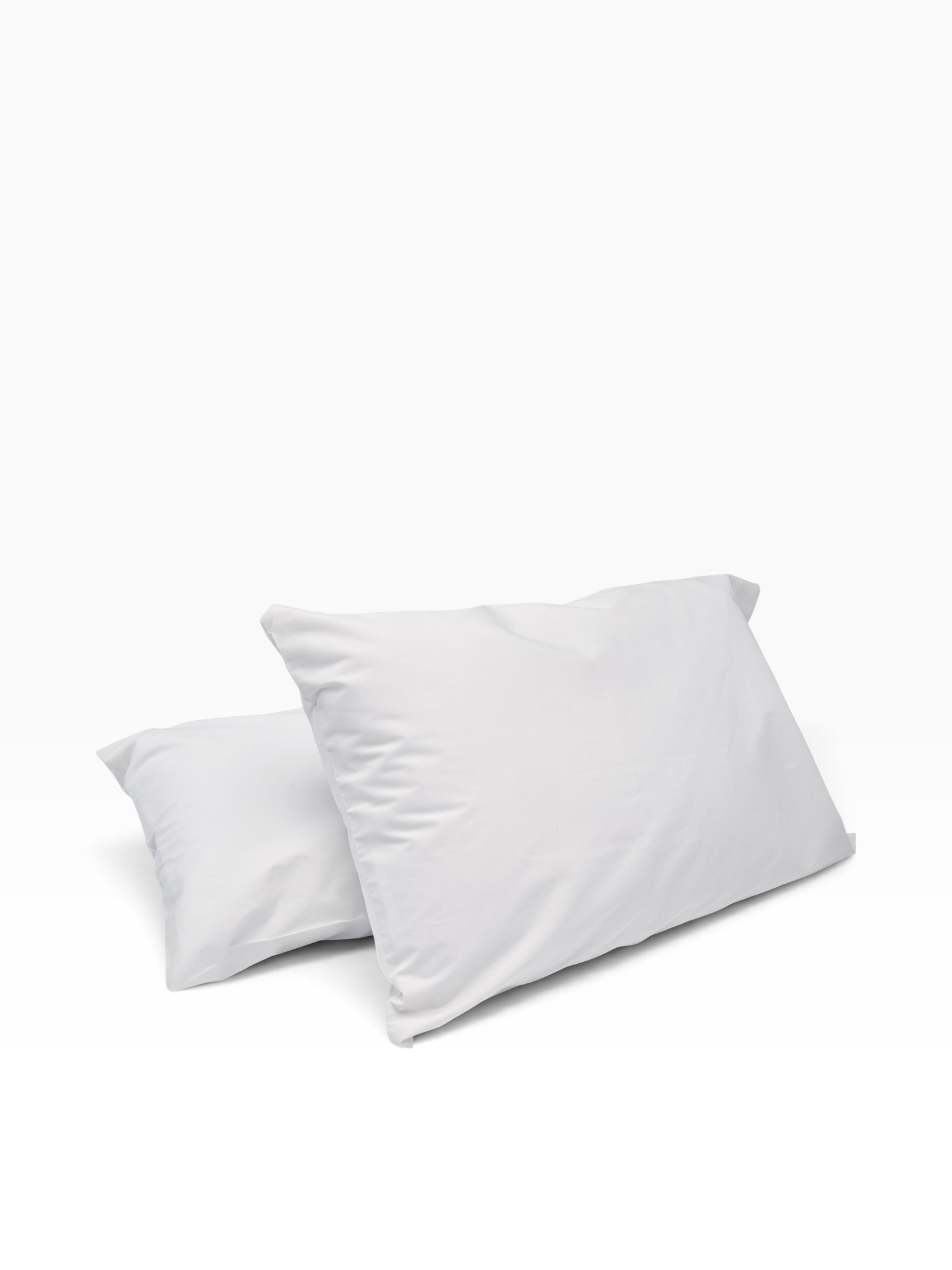 Valiant Products white T-180 thread count percale pillowcases made from a durable cotton-polyester blend.