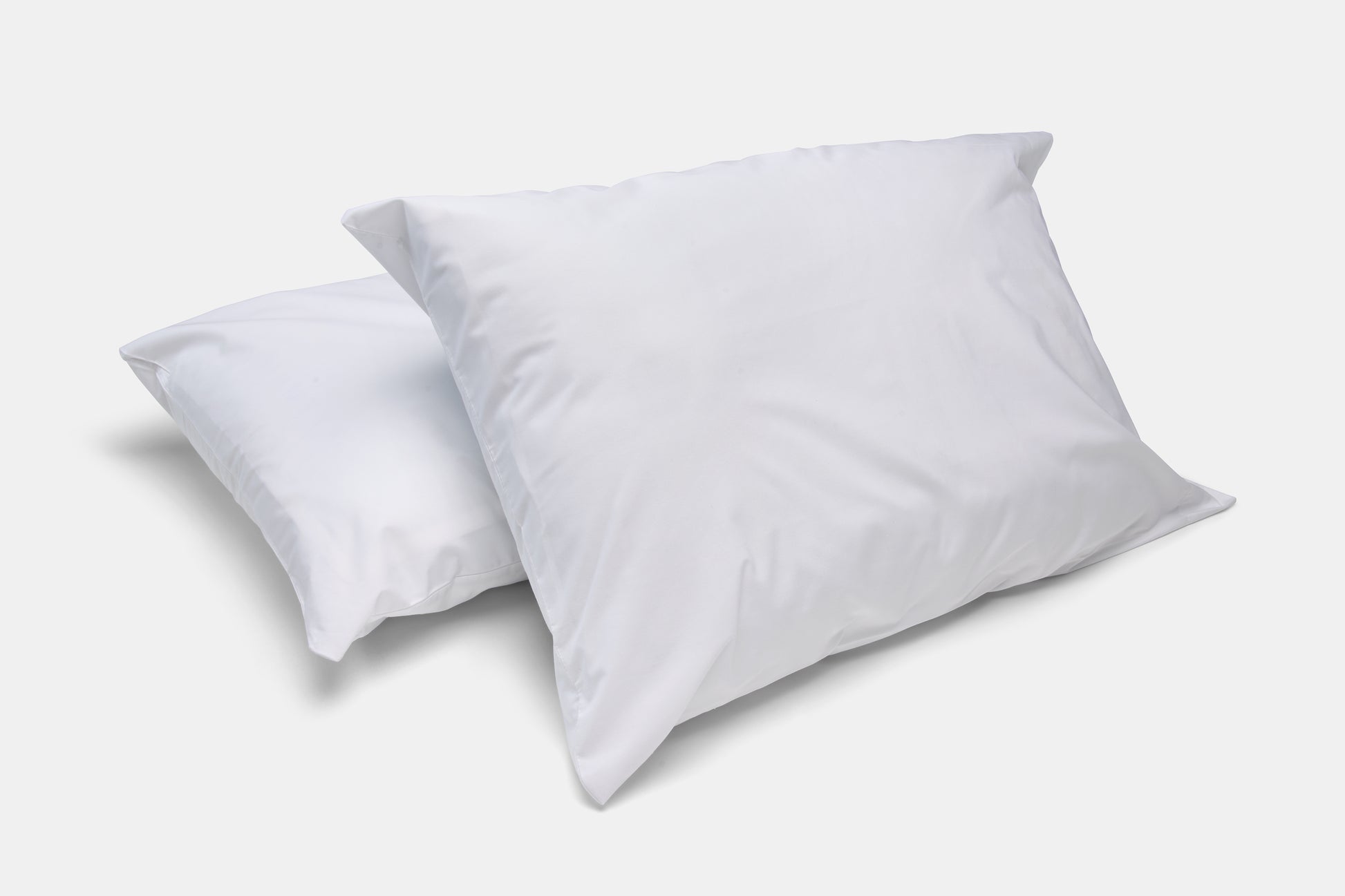 Valiant Products white 300 thread count cotton blend pillowcases with a smooth percale weave for hotel luxury