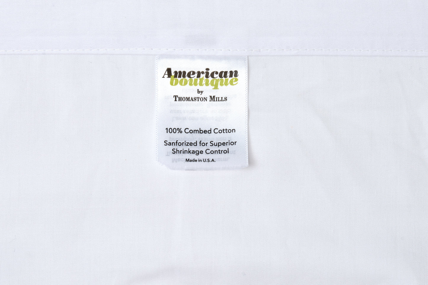 Valiant Products American Boutique white pillowcase fabric label with combed cotton and shrinkage control details