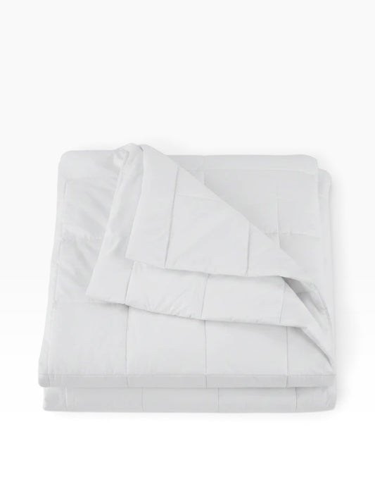 Valiant Products white EcoPure down alternative quilted blanket with a breathable cotton shell and box stitch design.