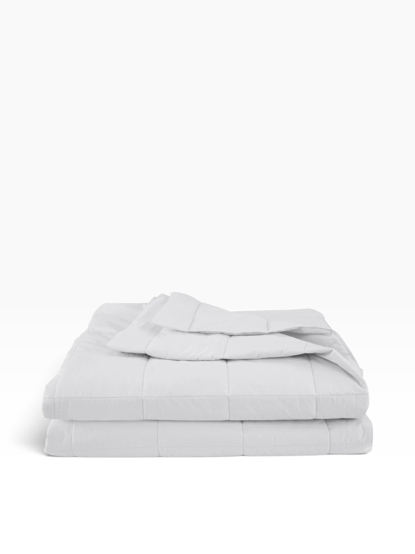 Valiant Products EcoPure white quilted down alternative blanket with box stitch pattern folded on a white background.