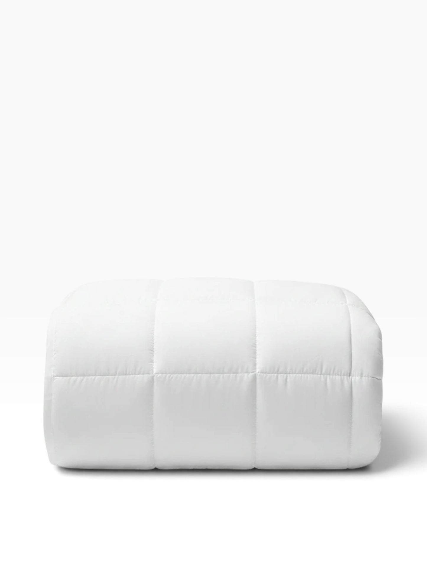 Valiant Products Ultra Touch FLEX white quilted microfiber down alternative blanket folded for storage.