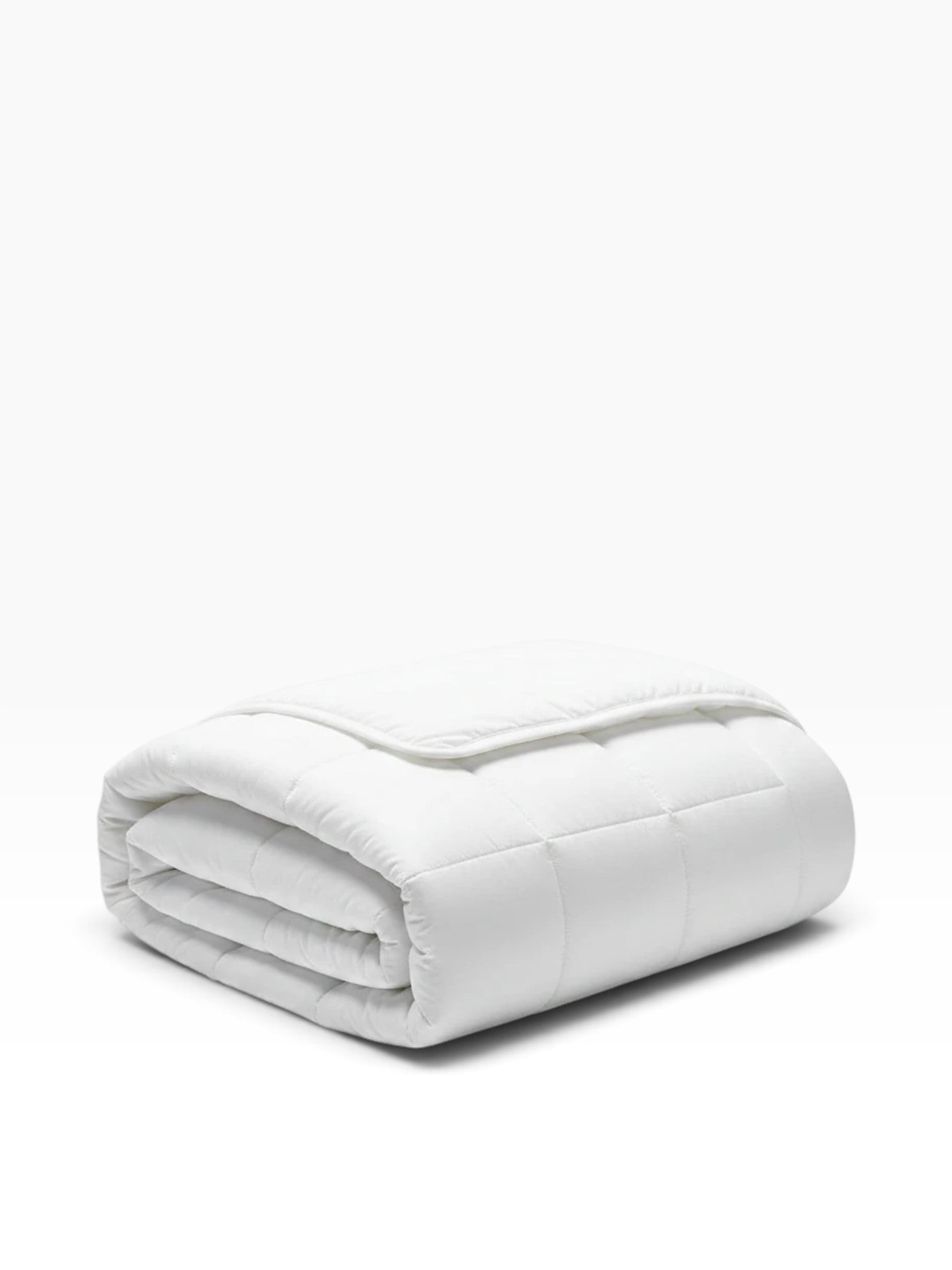 Valiant Products Ultra Touch FLEX white quilted down alternative microfiber blanket folded neatly.