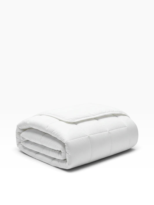 Valiant Products Ultra Touch FLEX white quilted down alternative microfiber blanket folded neatly.