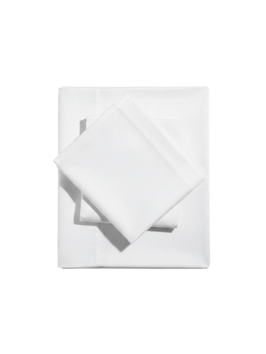 Valiant Products Ultra Touch Suites white standard pillowcases with a smooth, crisp finish folded neatly.