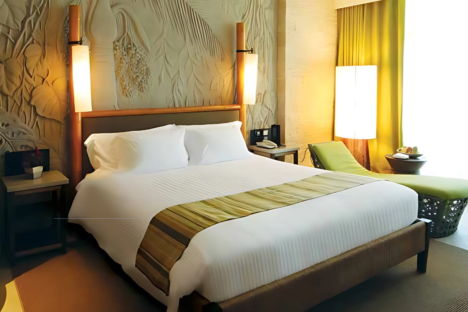 Valiant Products white stripe fitted sheets on a hotel bed with 310 thread count cotton blend fabric